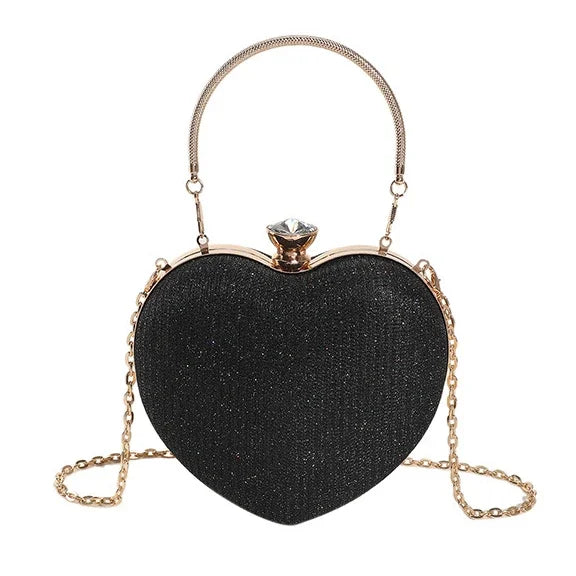 Bolso de metal brillante con forma de corazón