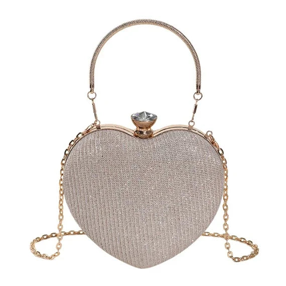 Bolso de metal brillante con forma de corazón