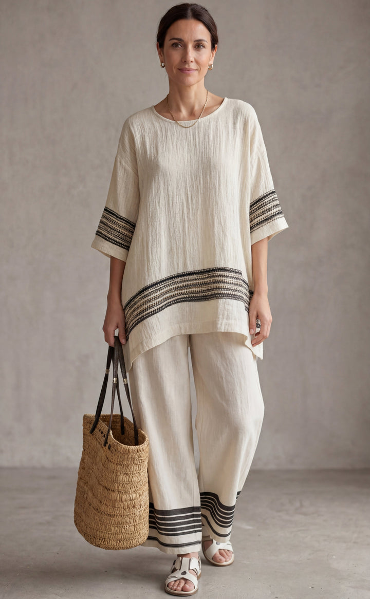 Mariella — Top elegante de lino con rayas negras y pantalones fluidos